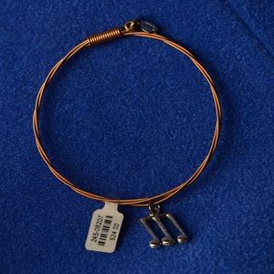 Guitar string bracelet with music note charm